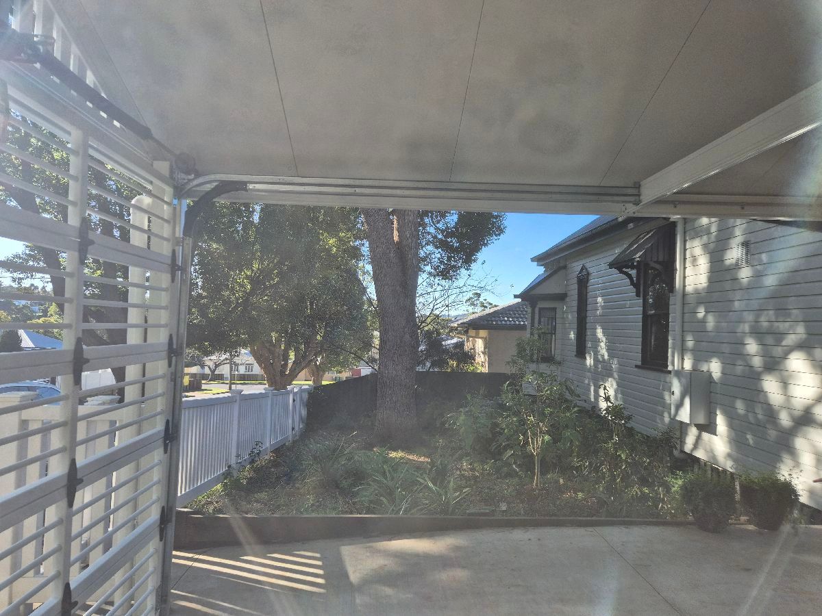 after Pro Texture White Aluminium Custom Door – Bar Grille, Newtown