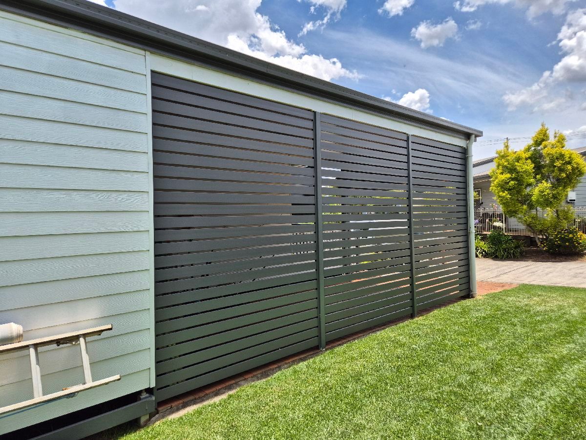 after Basalt Powder-coated Aluminium Custom Door – Carport Screening, Wilsonton