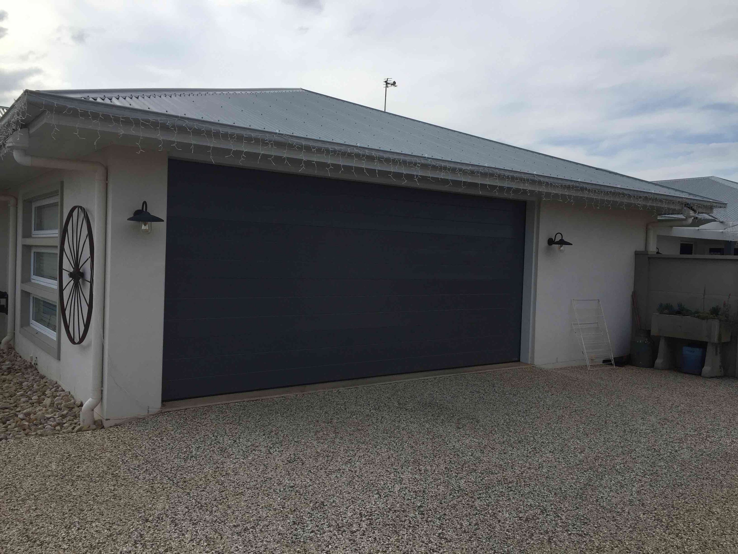 after Basalt Colorbond Steel Sectional Door – 2 x PD, Highfields
