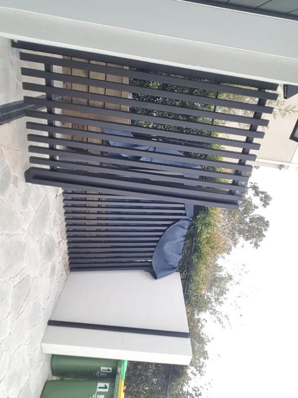 after Black Powder-coated Aluminium Custom Door – INSTALL: Bin enclosure gates, Prince Henry Heights