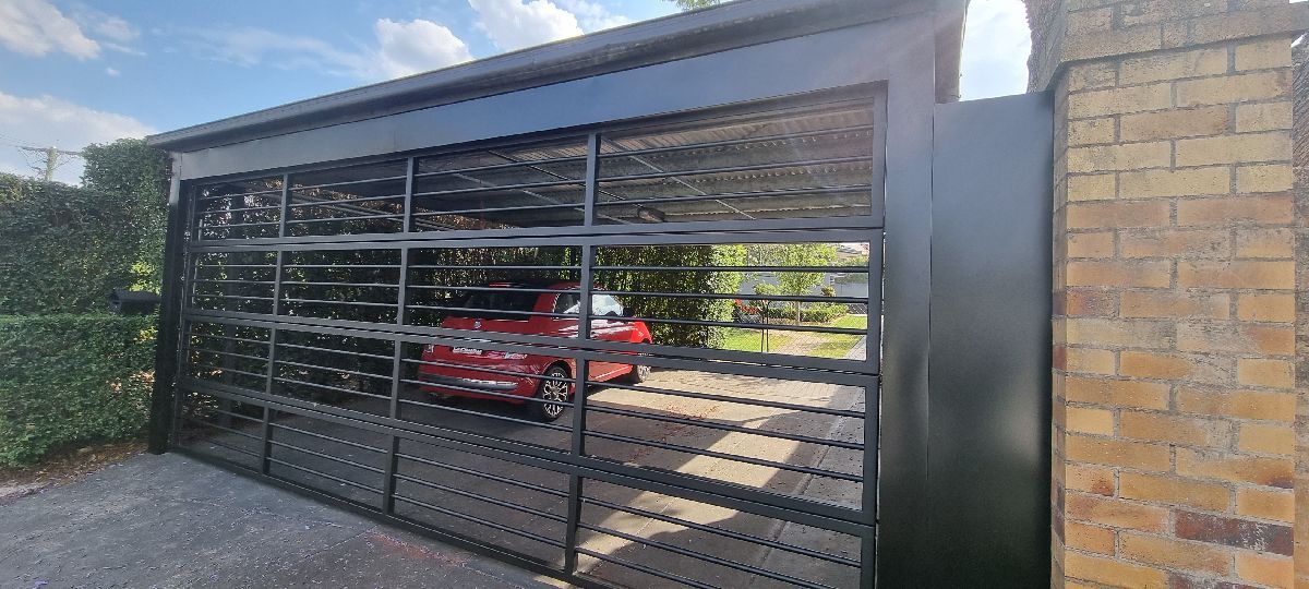 after Black Powder-coated Aluminium Custom Door – Bar Grille, Prince Henry Heights