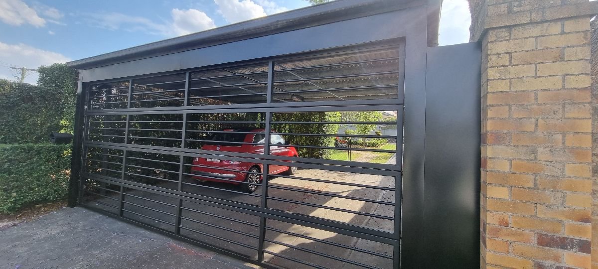 after Black Powder-coated Aluminium Custom Door – Bar Grille, Prince Henry Heights