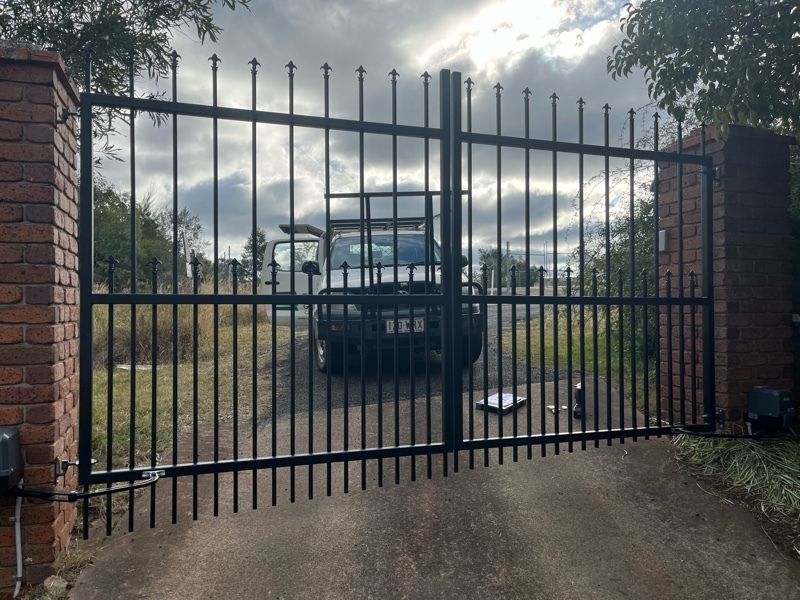 after Black Powder-coated Aluminium Swing Gate – Gate repairs, Kearneys Spring