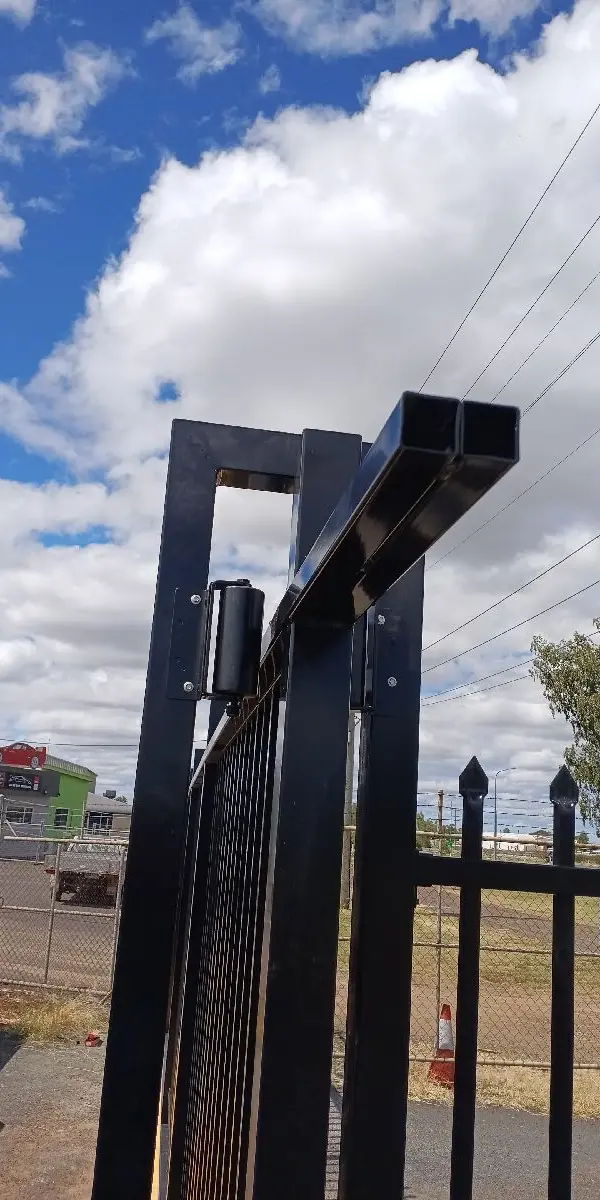 after Black Powder-coated Steel Sliding Gate – Gate Fab, Dalby