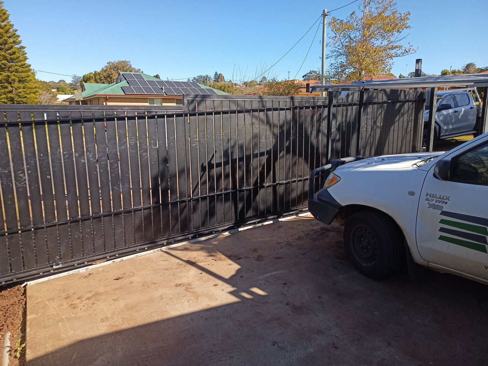 after Black Powder-coated Aluminium Sliding Gate – Aluminium Sliding Gate + Motor, South Toowoomba