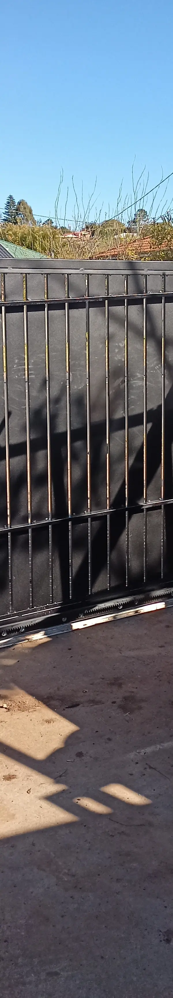 after Black Powder-coated Aluminium Sliding Gate – Aluminium Sliding Gate + Motor, South Toowoomba
