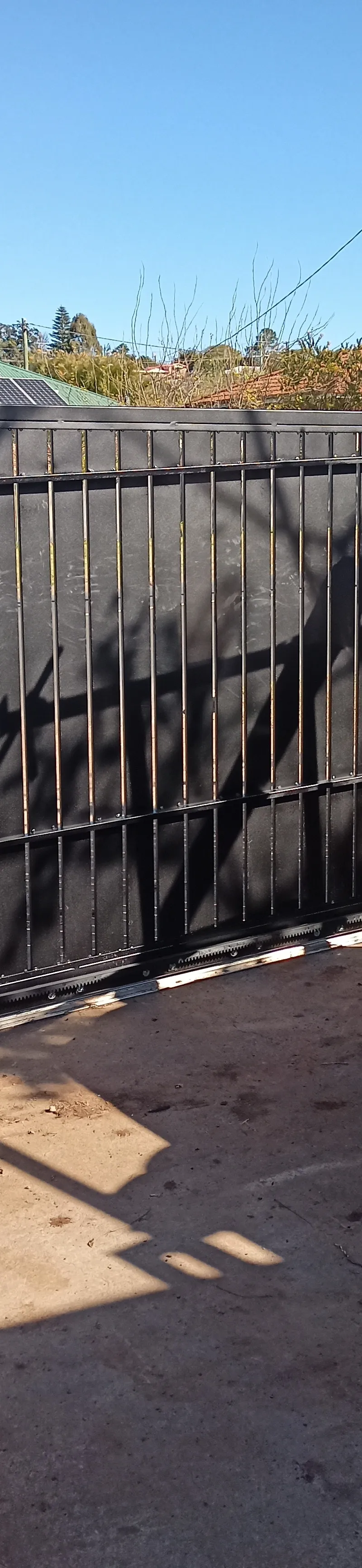 after Black Powder-coated Aluminium Sliding Gate – Aluminium Sliding Gate + Motor, South Toowoomba