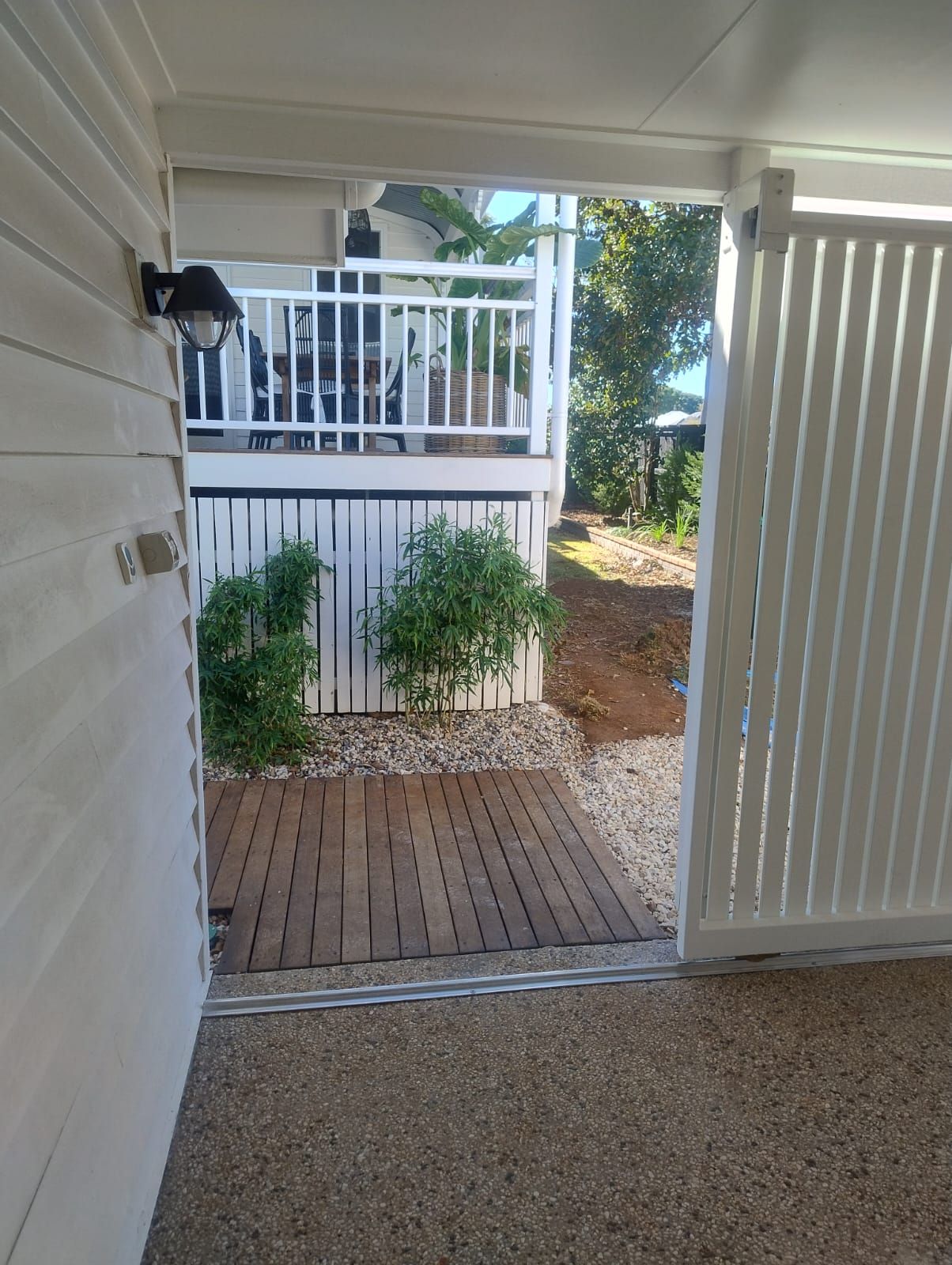 after Pro Texture White Powder-coated Aluminium Custom Door – Slat Screening, East Toowoomba