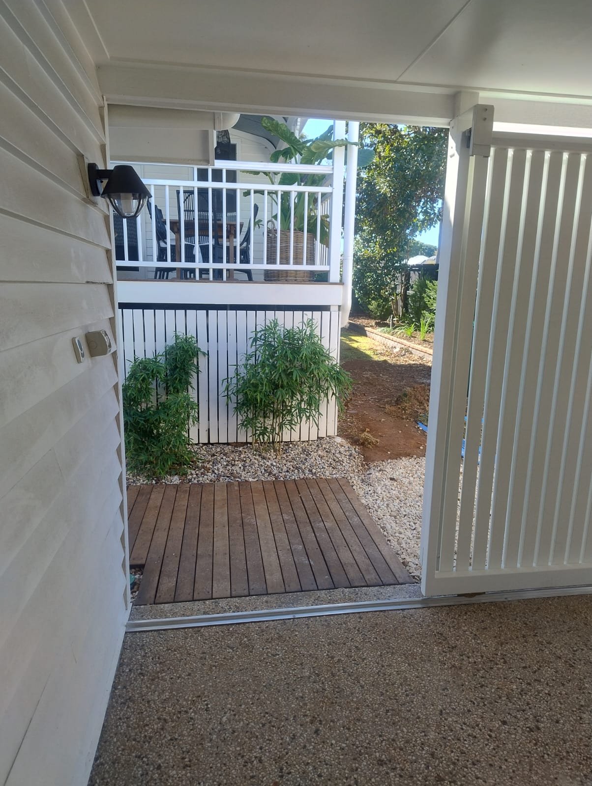 after Pro Texture White Powder-coated Aluminium Custom Door – Slat Screening, East Toowoomba