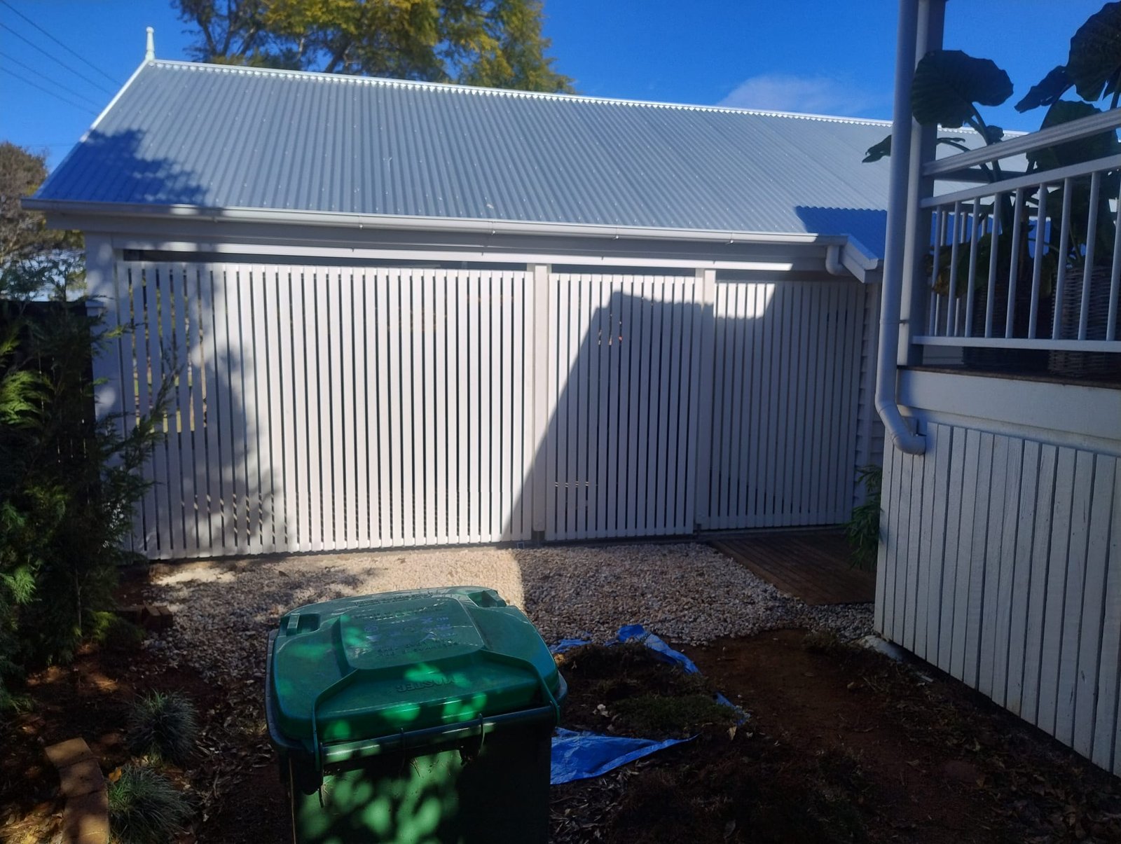 after Pro Texture White Powder-coated Aluminium Custom Door – Slat Screening, East Toowoomba