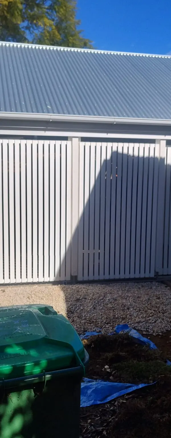 after Pro Texture White Powder-coated Aluminium Custom Door – Slat Screening, East Toowoomba