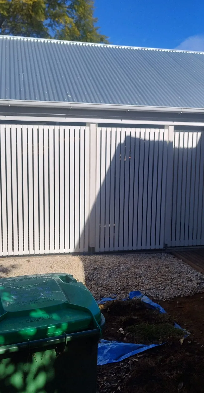 after Pro Texture White Powder-coated Aluminium Custom Door – Slat Screening, East Toowoomba