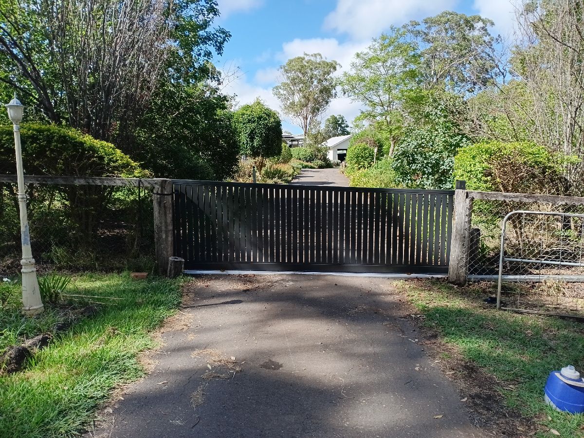 after Monument Powder-coated Aluminium Sliding Gate – Gate + Motor, Highfields