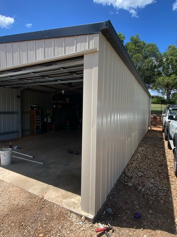 after Cream Colorbond Steel Workshop Door – Additional works: Walls/PA door, Helidon