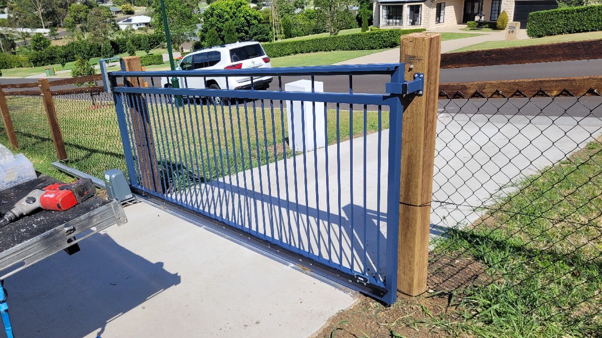 after Dark Blue Powder-coated Aluminium Sliding Gate – Gate Fab + Motorisation, Mount Rascal