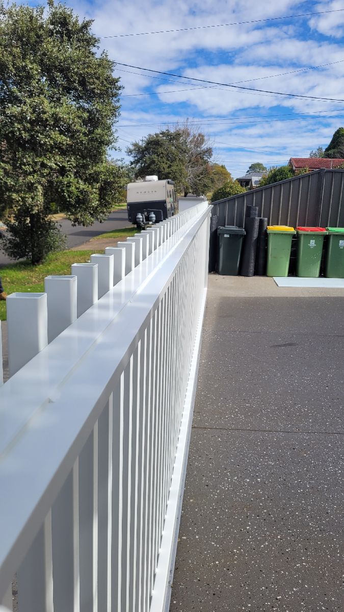 after Pro Texture White Powder-coated Aluminium Sliding Gate – Service Job - Slide Gate & Motor, Centenary Heights