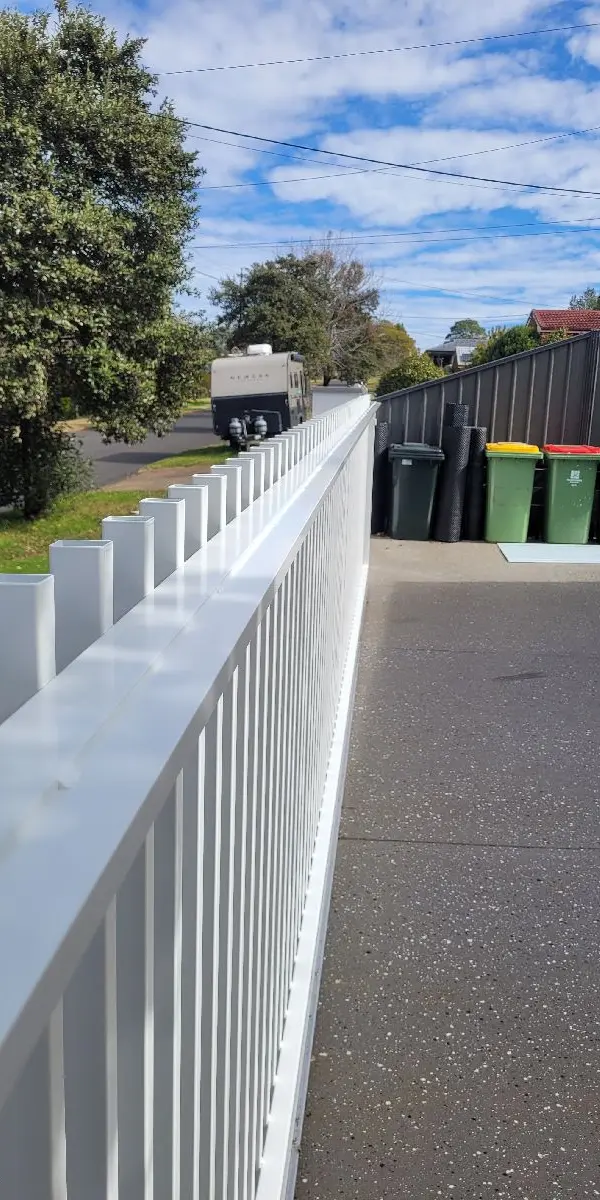 after Pro Texture White Powder-coated Aluminium Sliding Gate – Service Job - Slide Gate & Motor, Centenary Heights