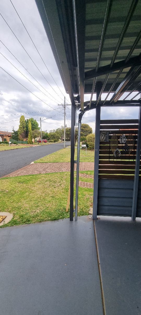 after Monument Powder-coated Aluminium Custom Door – Bar Grille, Harristown