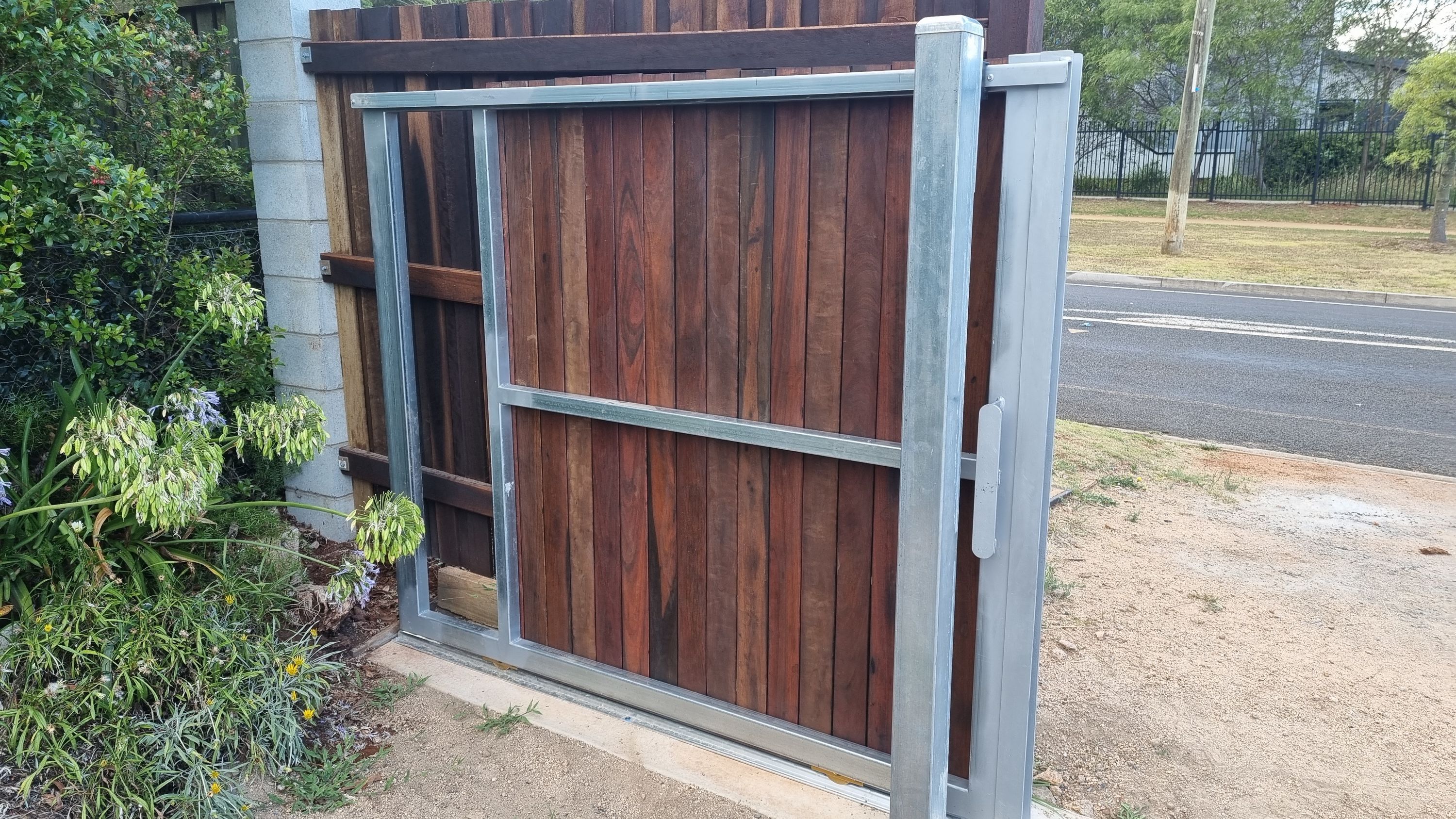 after Galvanised + Wood-look Galvanised Frame + Timber Palings Sliding Gate – Gate, Highfields