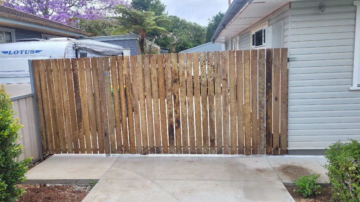 after Wood-look Colorbond + Galvanised Frame Sliding Gate – Steel Gate Frame + Motor, Centenary Heights