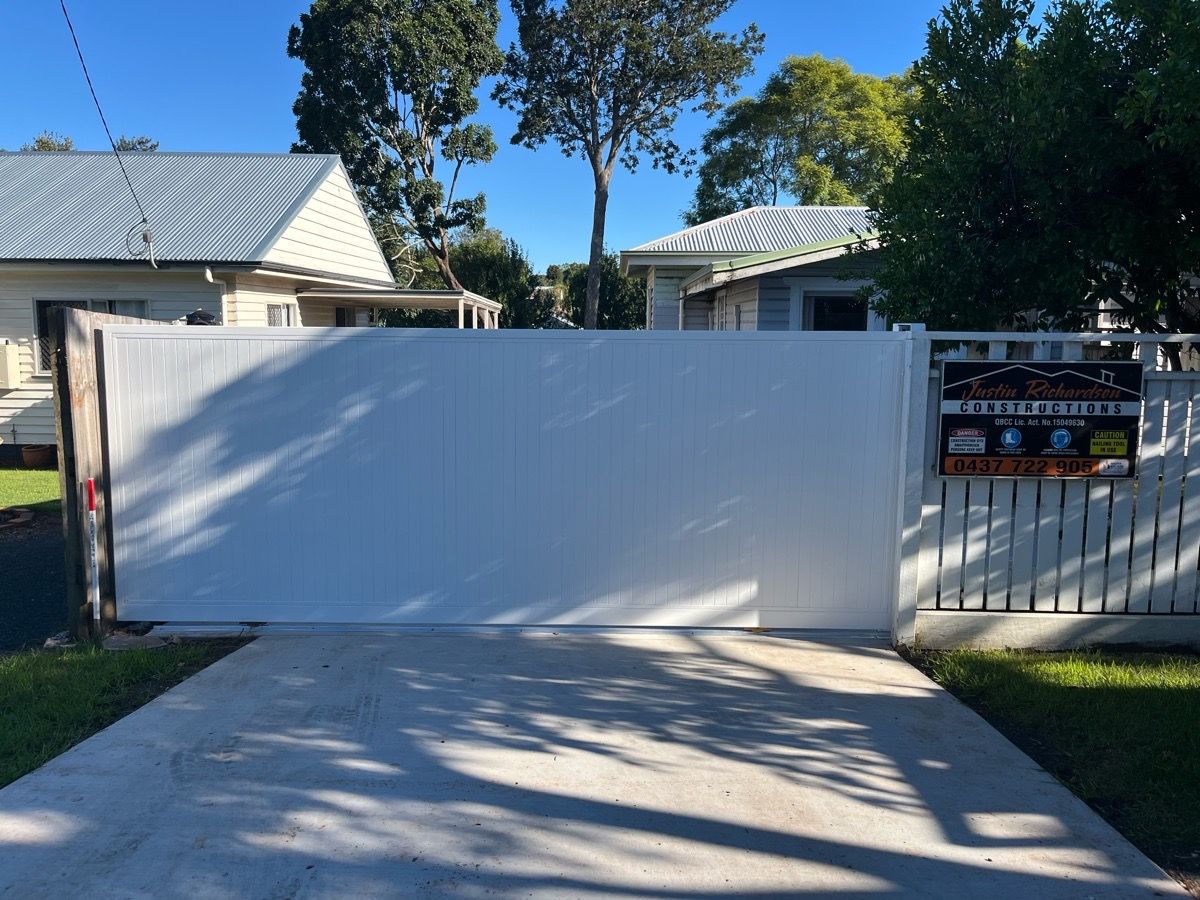 after Powder Coated White Powder-coated Aluminium Sliding Gate – Aluminium Sliding Gates + Motors, East Toowoomba