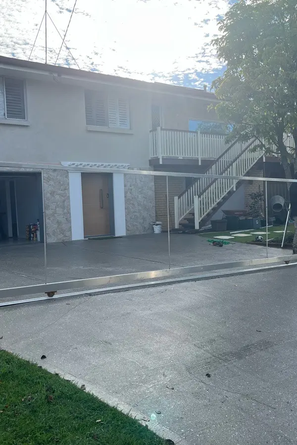 after Pro Texture White Powder-coated Aluminium Sliding Gate – Service Job - Slide Gate & Motor, Centenary Heights