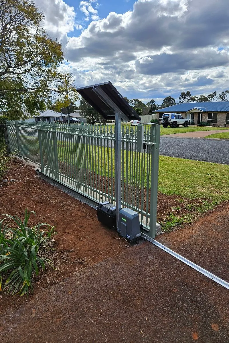 after Pale Eucalypt Powder-coated Steel Sliding Gate – Slide Gate + Fencing, Highfields