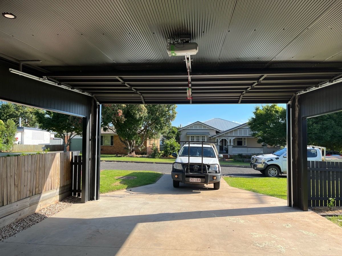 after Black Powder-coated Aluminium Custom Door – Ventilated Door, East Toowoomba