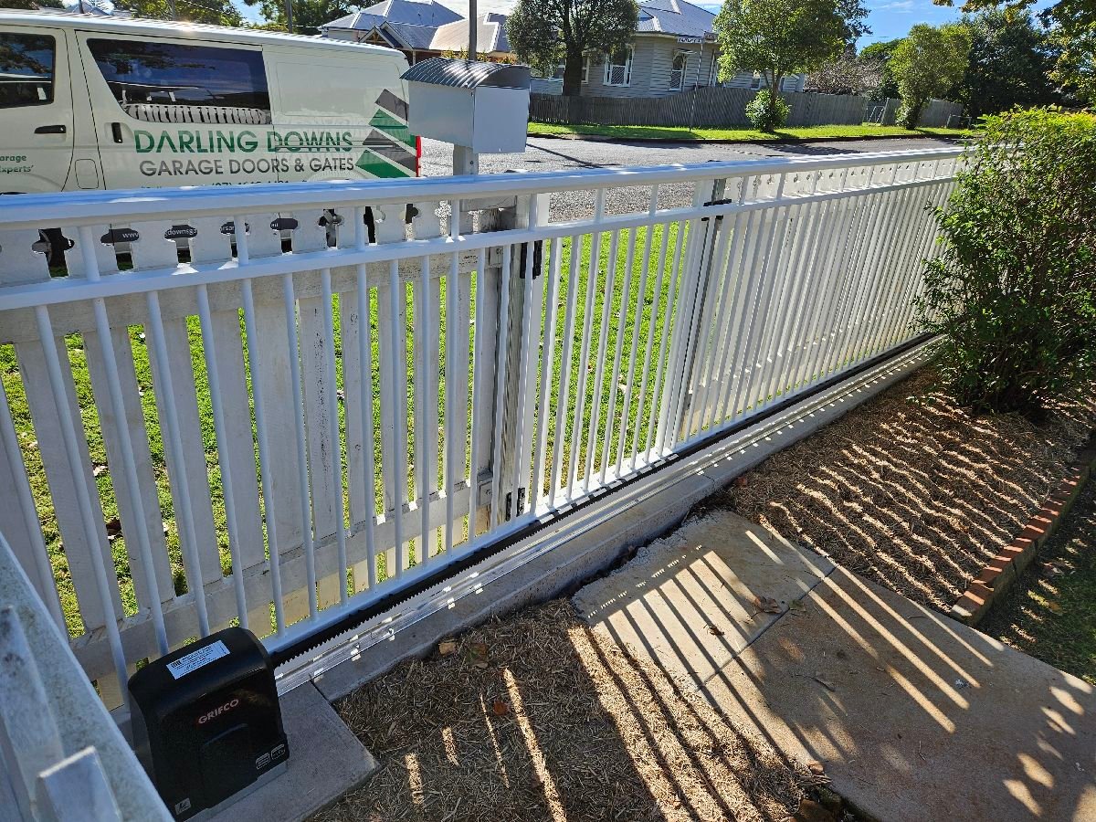 after Pro Texture White Powder-coated Aluminium Sliding Gate – Service Job - Slide + PA Gates, Newtown