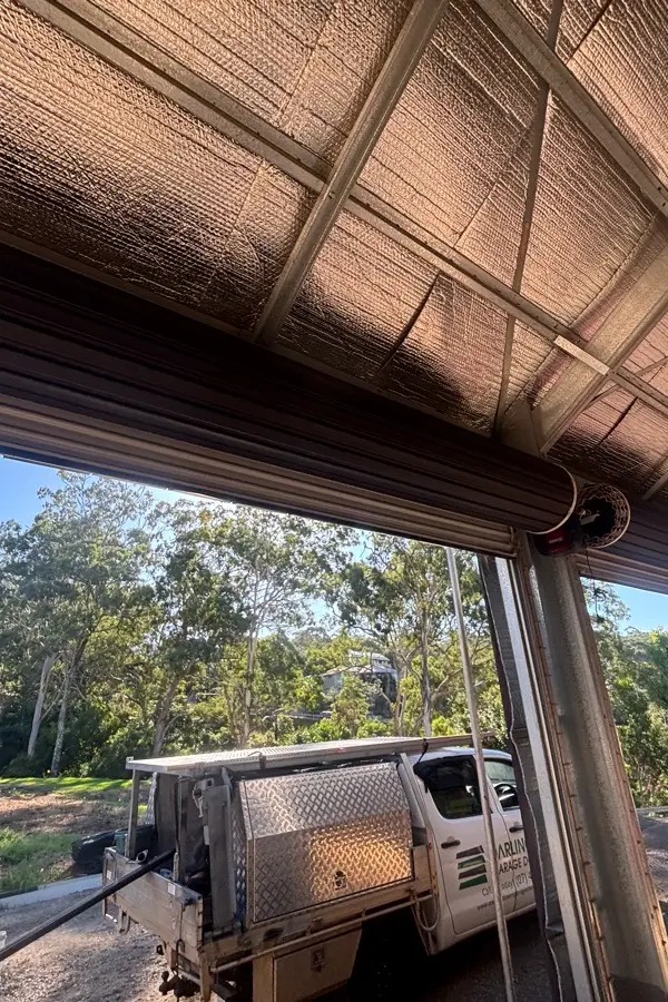after Black Colorbond Steel Tilt Door – Tilt door quote, Mount Lofty