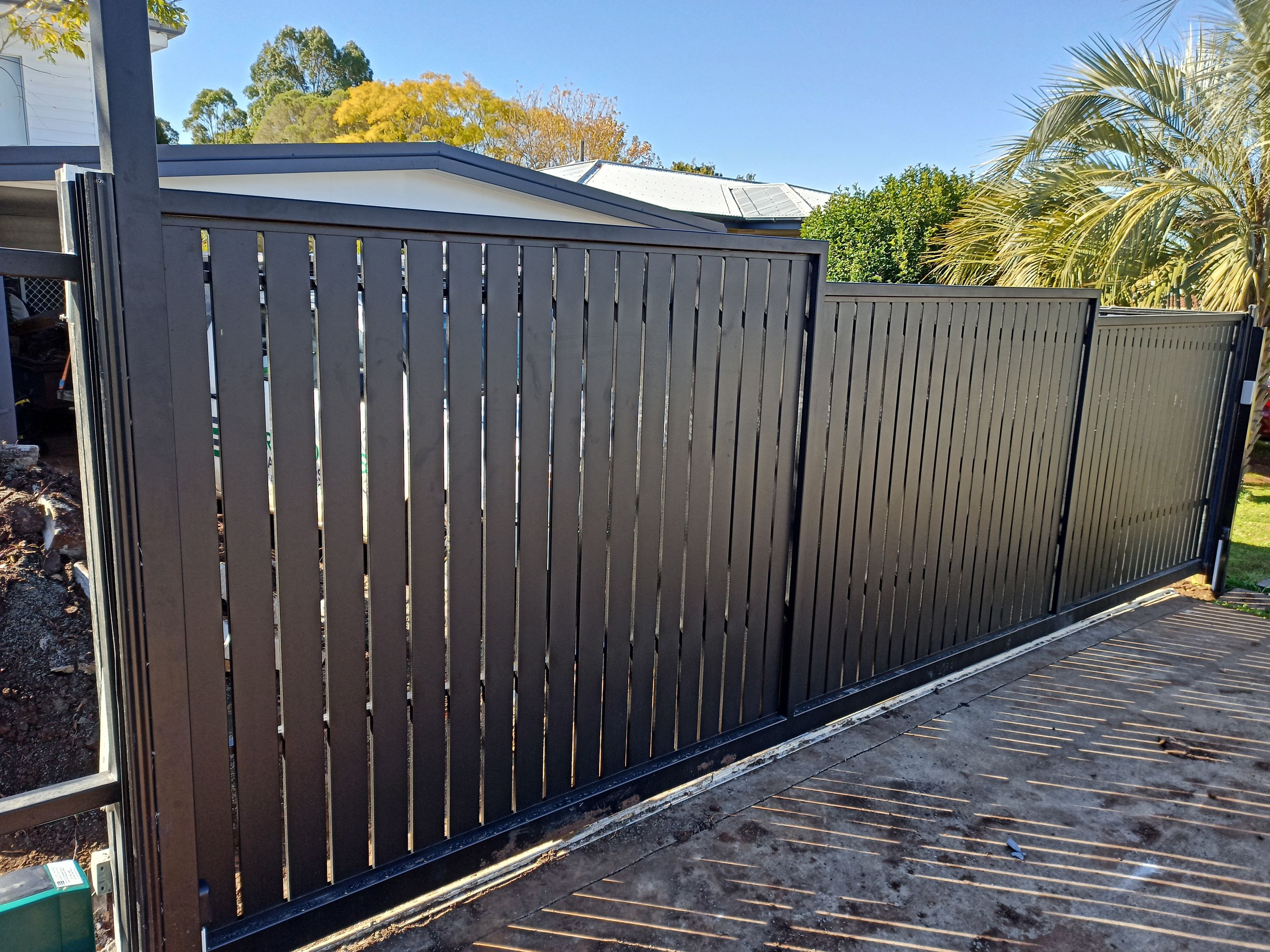 after Black Powder-coated Aluminium Sliding Gate – Aluminium Sliding Gate + Motor, South Toowoomba