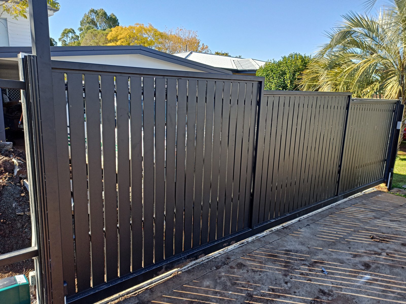 after Black Powder-coated Aluminium Sliding Gate – Aluminium Sliding Gate + Motor, South Toowoomba
