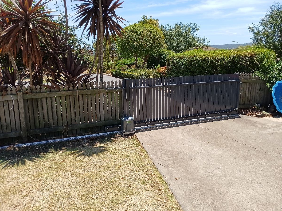 after Ironstone Powder-coated Aluminium Sliding Gate – Gate + Motor, Cotswold Hills