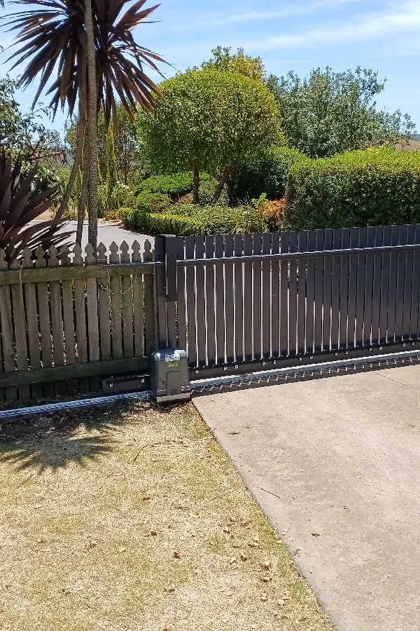 after Ironstone Powder-coated Aluminium Sliding Gate – Gate + Motor, Cotswold Hills