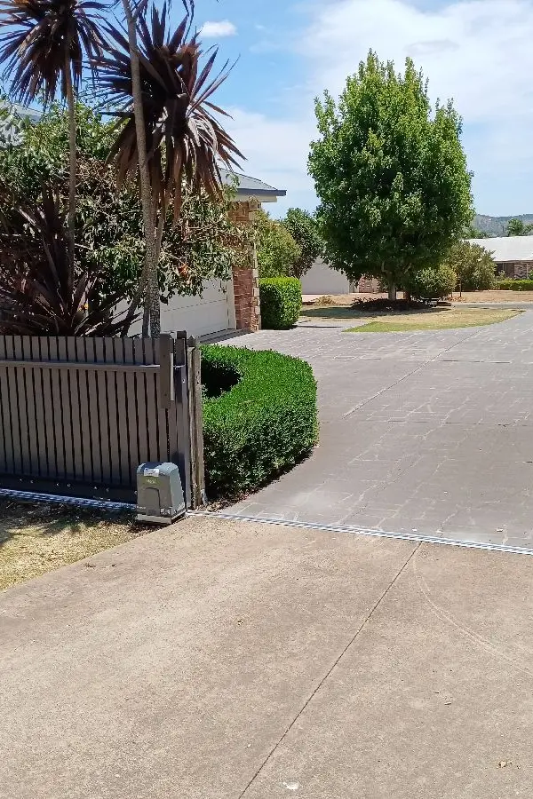 after Ironstone Powder-coated Aluminium Sliding Gate – Gate + Motor, Cotswold Hills