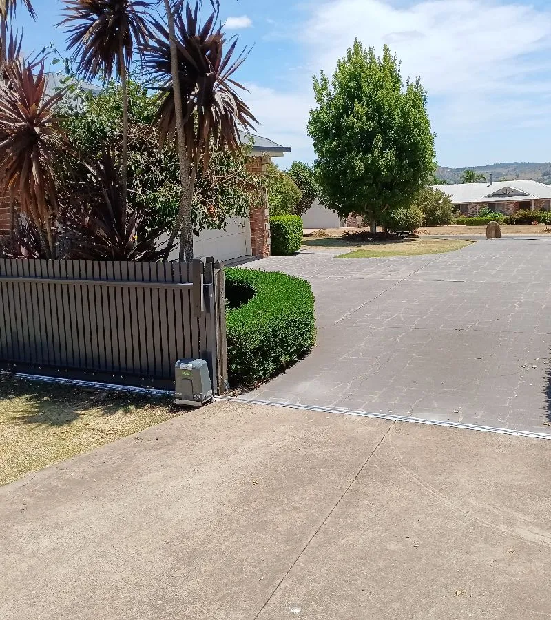 after Ironstone Powder-coated Aluminium Sliding Gate – Gate + Motor, Cotswold Hills