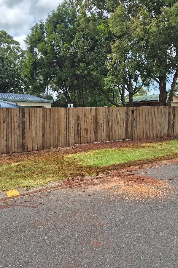 after Wood-look Timber Custom Door – Timber Fencing + Gate, Highfields