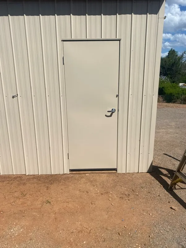 after Cream Colorbond Steel Workshop Door – Additional works: Walls/PA door, Helidon