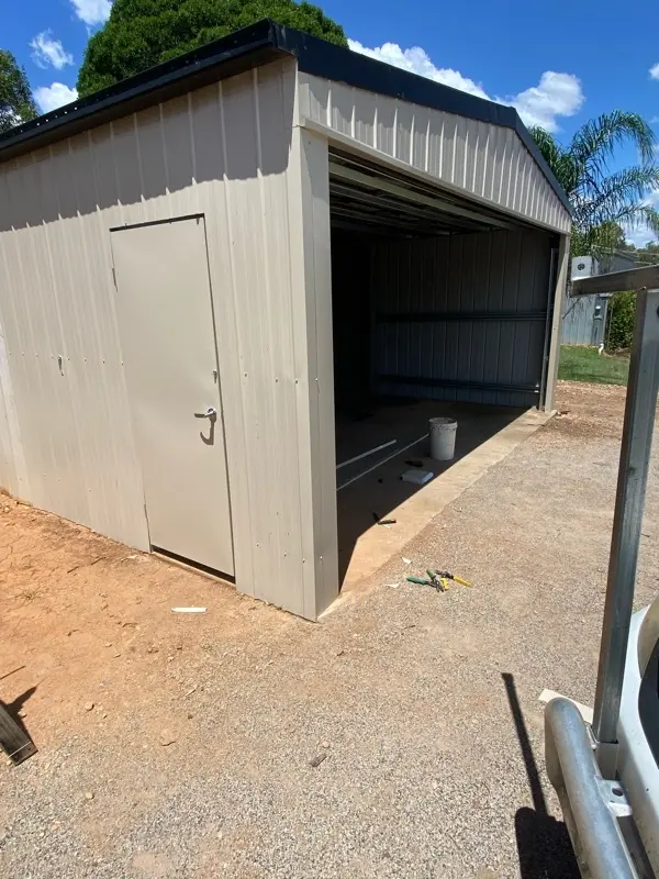 after Cream Colorbond Steel Workshop Door – Additional works: Walls/PA door, Helidon
