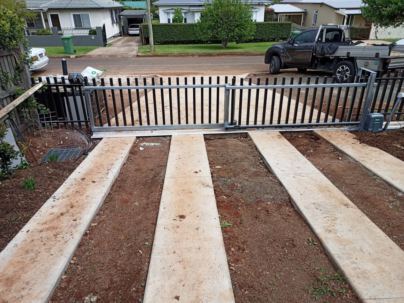 after Black Colorbond + Galvanised Frame Sliding Gate – GAL Frame + Palings by others, Toowoomba