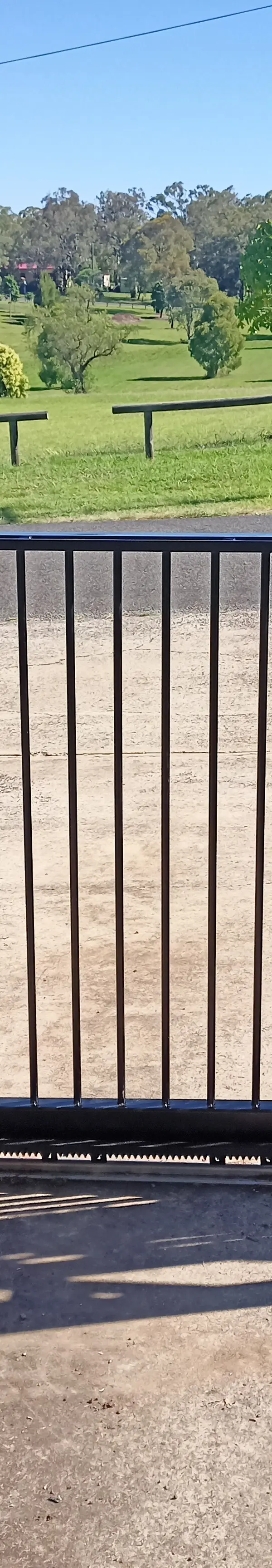 after Black Powder-coated Aluminium Sliding Gate – PIPE GATE + 240V motor, Meringandan West