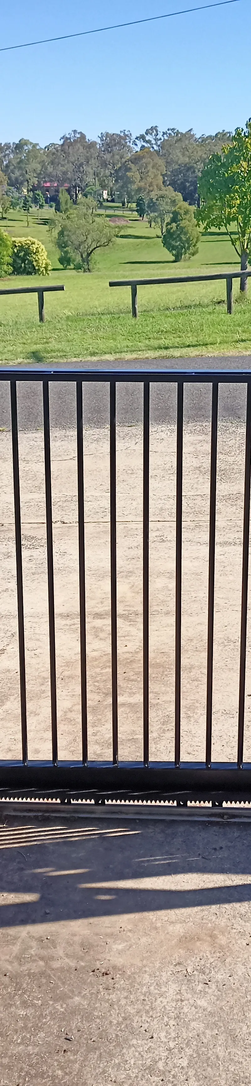 after Black Powder-coated Aluminium Sliding Gate – PIPE GATE + 240V motor, Meringandan West