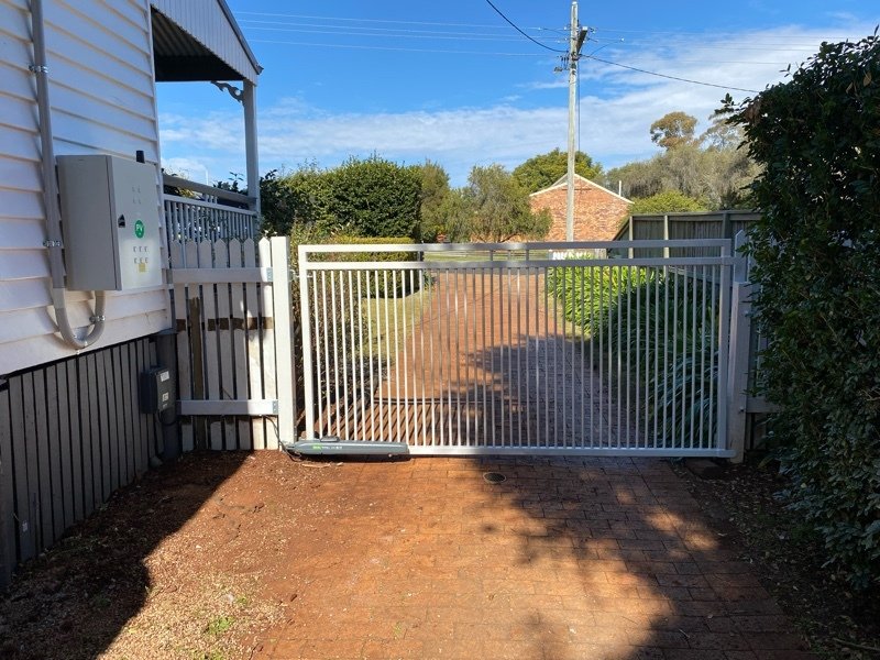 after Wood-look Powder-coated Steel Swing Gate – Pipe Gate + posts, South Toowoomba