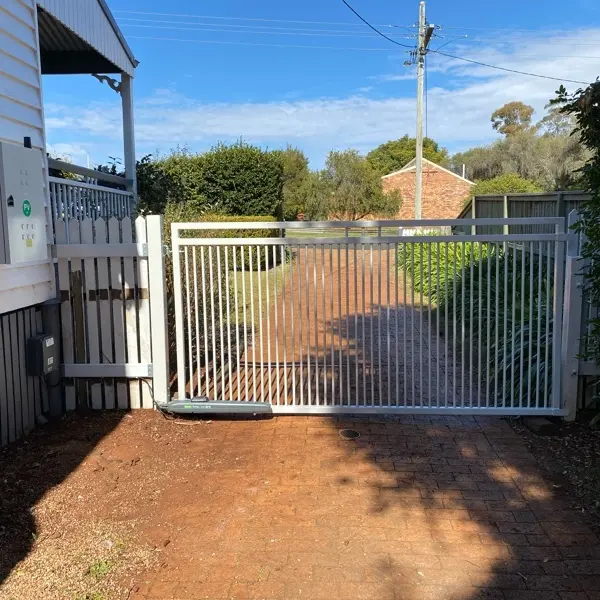 after Wood-look Powder-coated Steel Swing Gate – Pipe Gate + posts, South Toowoomba