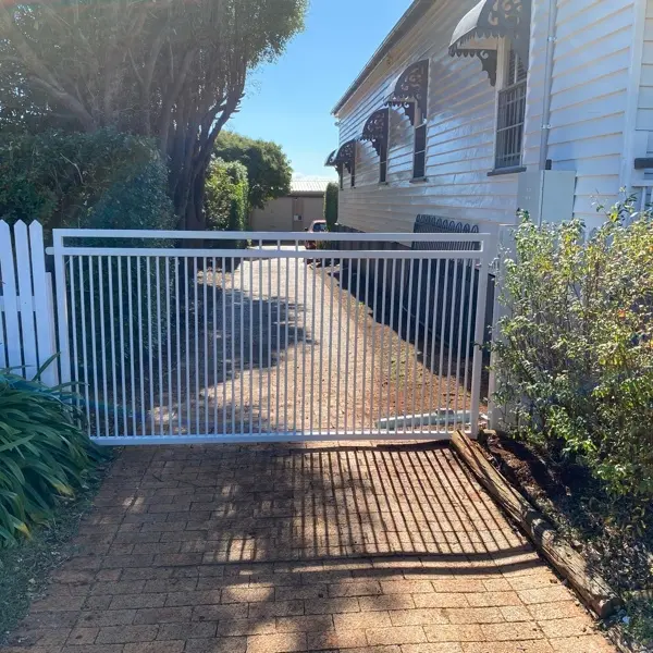 after Wood-look Powder-coated Steel Swing Gate – Pipe Gate + posts, South Toowoomba