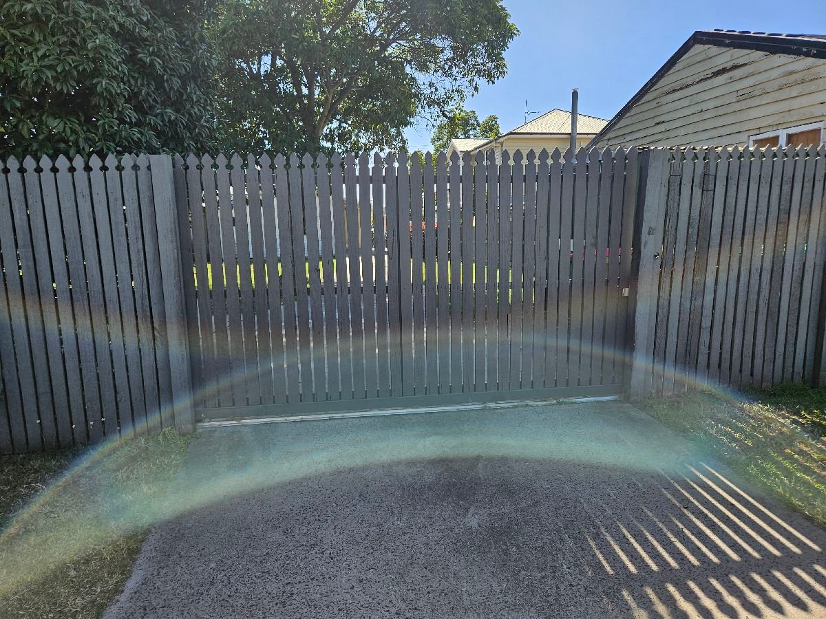 after Woodland Grey Timber Sliding Gate – Timber Gate Repair, East Toowoomba