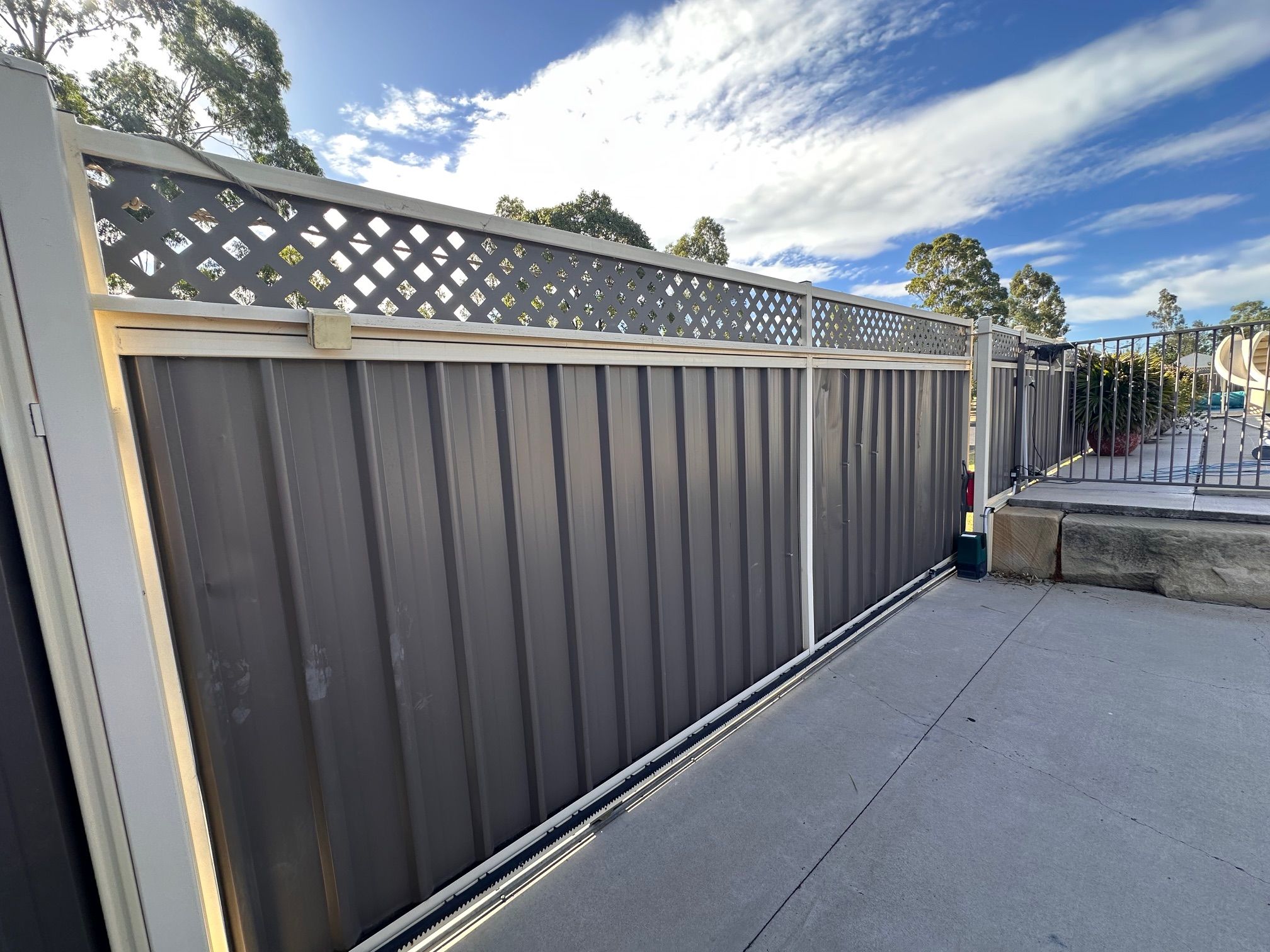 after Brown Colorbond + Lattice Sliding Gate – Walton repair, Dalby