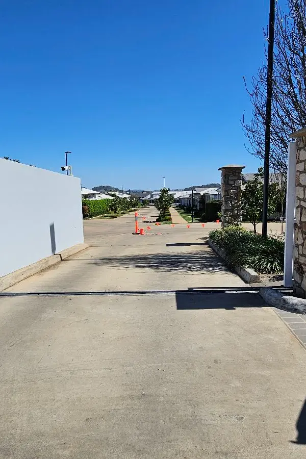 after White Powder-coated Aluminium Sliding Gate – Sliding Gate + Motor, Harristown