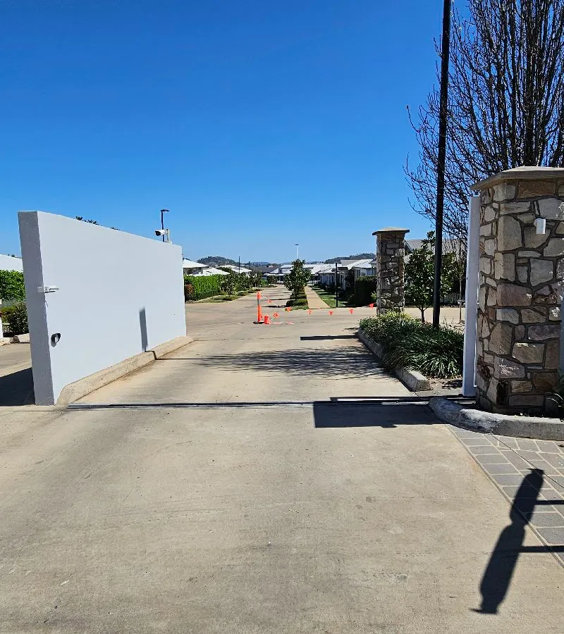 after White Powder-coated Aluminium Sliding Gate – Sliding Gate + Motor, Harristown
