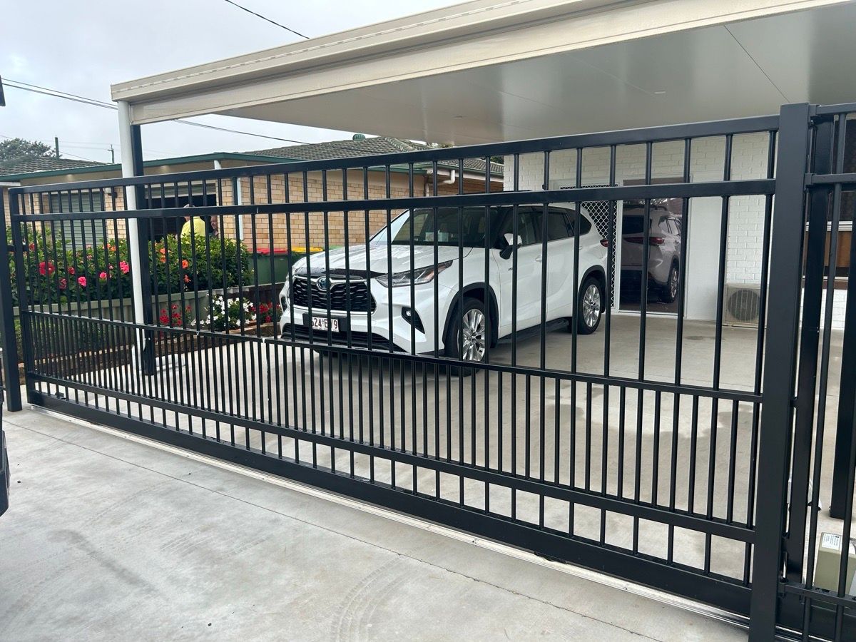 after Black Powder-coated Steel Sliding Gate – Fence Panels + Install customer supplied gate, Wilsonton